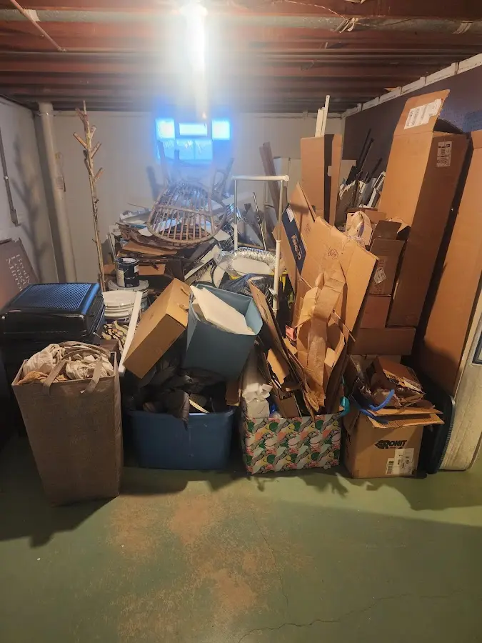 Roll-off dumpster container at job site for 2 Yard Dumpster Rental in Freedom